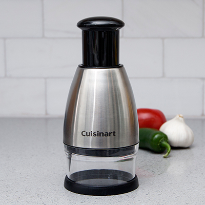 CUISINART<sup>&reg;</sup> Chopper - Chop, dice and mince with this stainless steel food chopper.  Chopper housing and blades are both stainless steel for durability and easy clean up.  Blade rotates as it chops, blade guard rotates to clean edges and clear-view chopping chamber lets you easily see what you are chopping.