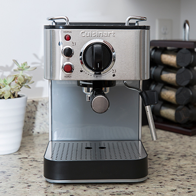 CUISINART<sup>&reg;</sup> Espresso Maker- Espresso maker with 15 bars of pressure for perfect coffee drinks. Brews 1 to 2 cups from either ground espresso or pods. Features a 53-ounce removable reservoir and includes porta-filter holder, cup-warming plate, steam nozzle, frothing cup, removable drip tray and tamping tool.